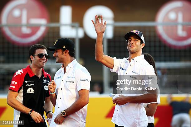 Daniel Ricciardo HRT Formula One Team with Vitantonio Liuzzi HRT Formula One Team and Jerome d'Ambrosio Virgin Racing. Formula One World...