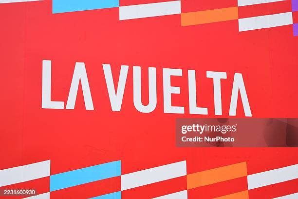 The logo of the Spanish cycling race La Vuelta appears during stage 4 of the 2025 edition in the town of Voiron, France, on August 26, 2025.
