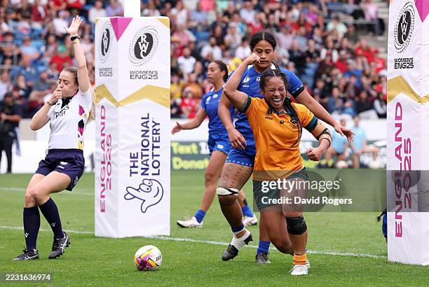 Cecilia Smith of Australia celebrates scoring her team's eighth try during the Women's Rugby World Cup 2025 Pool A match between Australia and Samoa...
