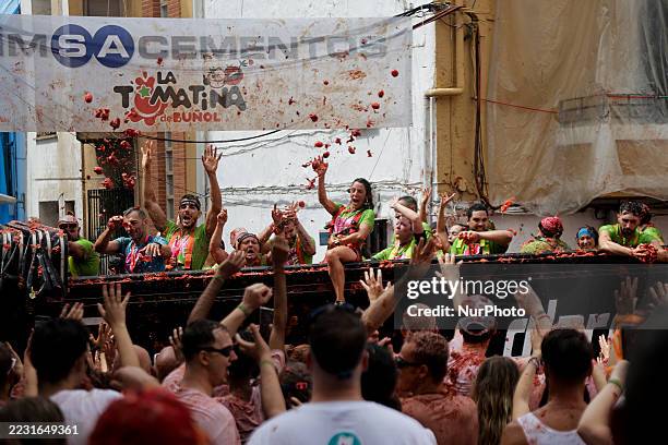 People covered in tomato pulp take part in the 78th 'Tomatina' Festival in Bunol, Spain, on August 27, 2025. They throw a total of 120 tonnes of...
