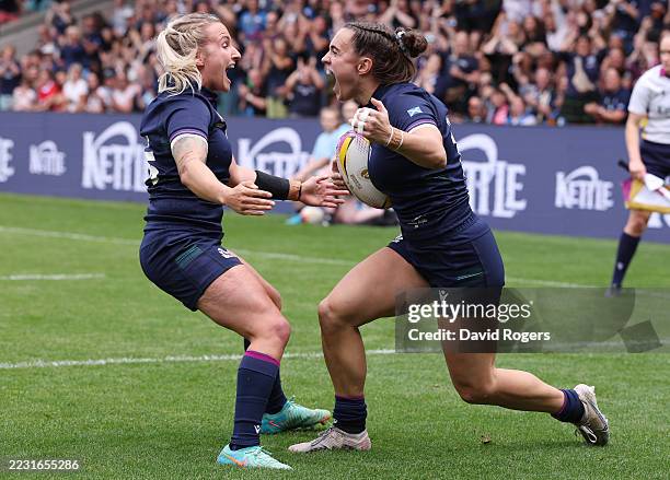 Francesca McGhie of Scotland celebrates with Chloe Rollie of Scotland, after scoring her team's second try during the Women's Rugby World Cup 2025...