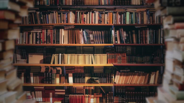 https://media.gettyimages.com/id/2231661464/video/library-stack-of-books-zooming-through-bookshelves.jpg?b=1&s=640x640&k=20&c=KkDIFaFMtG2mIt-lOauxHJ_bTq0XOvaMaAt2Xp8SMSc=