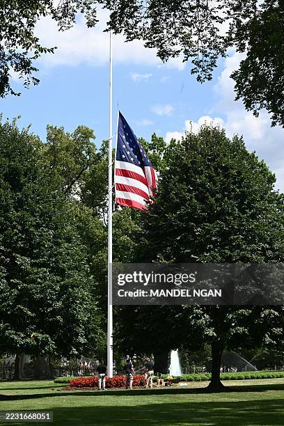 Flag the White House flies at half-staff in Washington, DC on August 27, 2025. US President Donald Trump ordered flags to be lowered in respect to...
