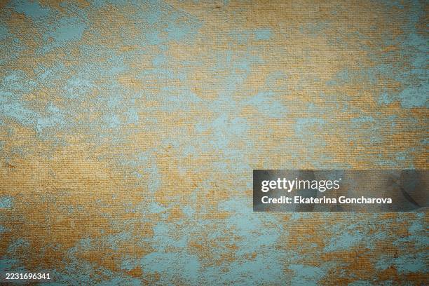 textured abstract surface with blue and gold gradient design - teal paint stock pictures, royalty-free photos & images