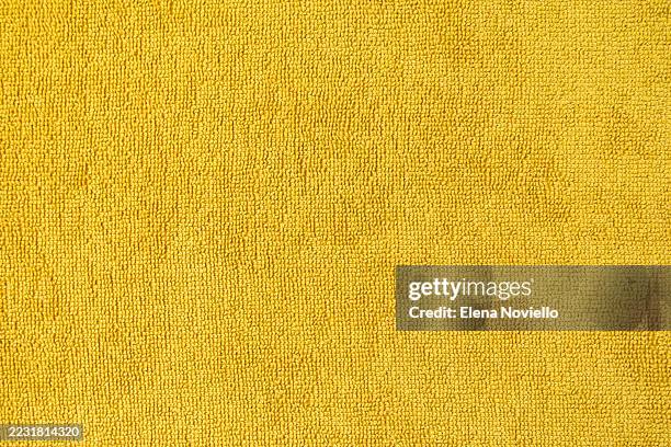 textured yellow fabric background showcasing soft fibers and vibrant color, ideal for design projects and creative applications with copy space - wool stock pictures, royalty-free photos & images