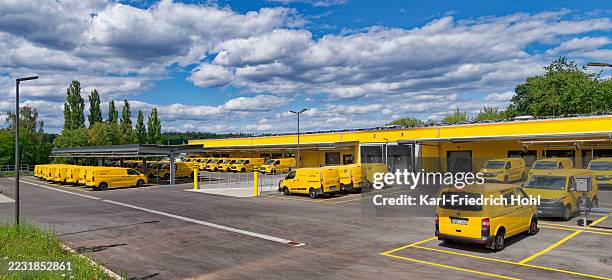 dhl and deutsche post delivery van - electric van fleet stock pictures, royalty-free photos & images