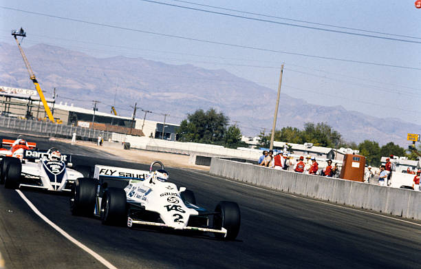 Carlos Reutemann, Williams FW07C Ford, leads Nelson Piquet, Brabham BT49C Ford, and Mario Andretti, Alfa Romeo 179C during the Caesars Palace GP at...