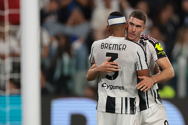 Dusan Vlahovic of Juventus celebrates with team mate Gleison Bremer after scoring to give the side a 2-0 lead during the Serie A match between...
