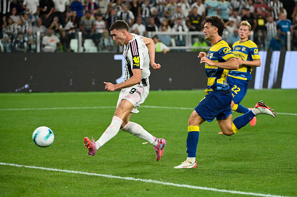 Dusan Vlahovic of Juventus FC shoots on goal against Zion Suzuki of Parma Calcio 1913 during the Serie A match between Juventus FC and Parma Calcio...