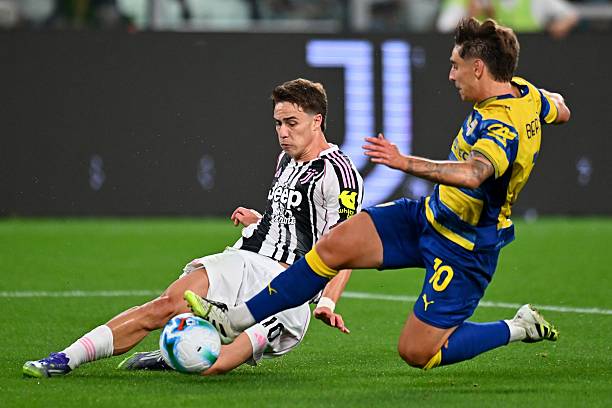 Kenan Yıldız of Juventus competes for the ball with Adrian Bernabe of Parma Calcio during the Serie A match between Juventus FC and Parma Calcio 1913...