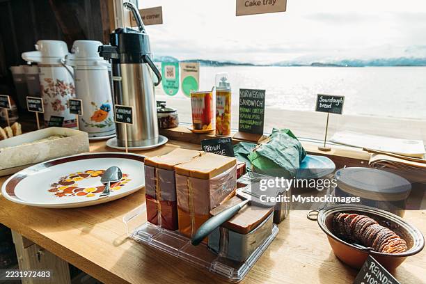 rustic lakeside breakfast buffet with cheese and bread - simple living stock pictures, royalty-free photos & images