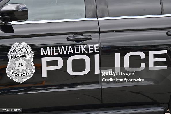 Milwaukee Police The Milwaukee Police Department logo is seen on the side of a vehicle ...