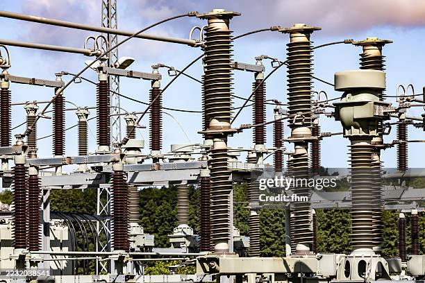 insulation at an electric transformer station - electricity substation stock pictures, royalty-free photos & images