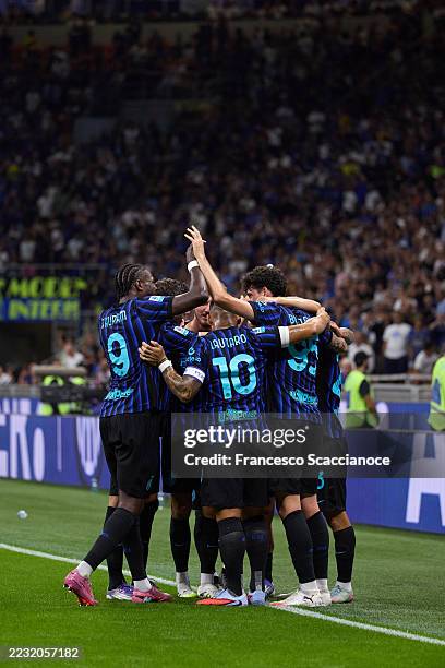 Alessandro Bastoni of FC Internazionale celebrates with his teammates after scoring his team's first goal during the Serie A match between FC...