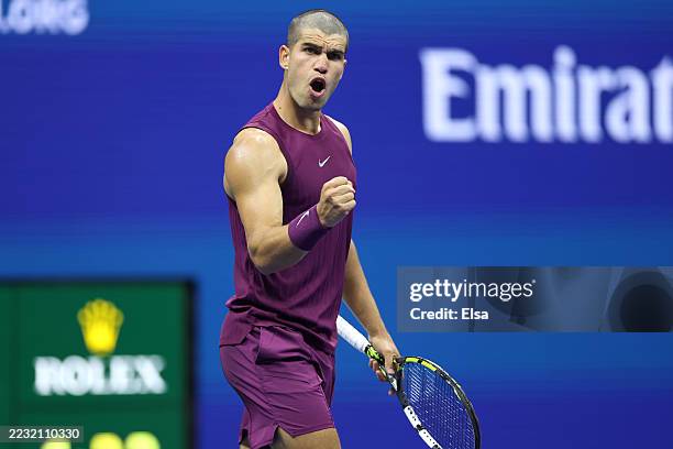 Carlos Alcaraz of Spain celebrates after winning the second set against Reilly Opelka of the United States during their Men's Singles First Round...
