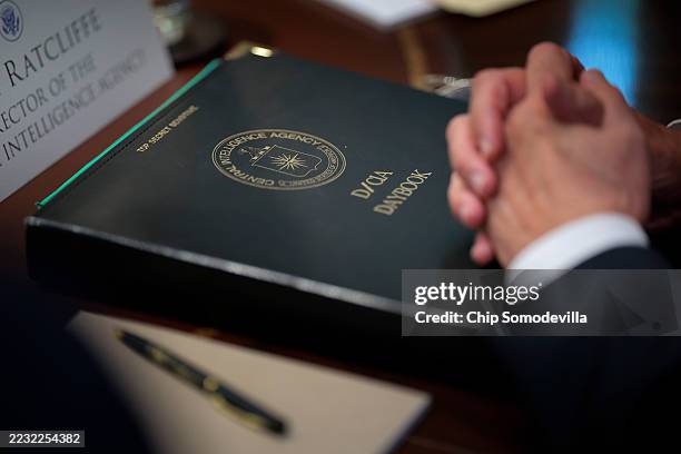 Central Intelligence Agency Director John Ratcliffe attends a cabinet meeting with U.S. President Donald Trump in the Cabinet Room of the White House...