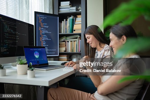 IT Specialists Work On Program Coding Using AI Technology IT Specialists Work On Program Coding Using AI Technology