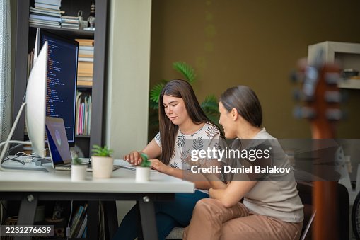 Programmers Analyzing Code On Computer Using AI Support Programmers Analyzing Code On Computer Using AI Support
