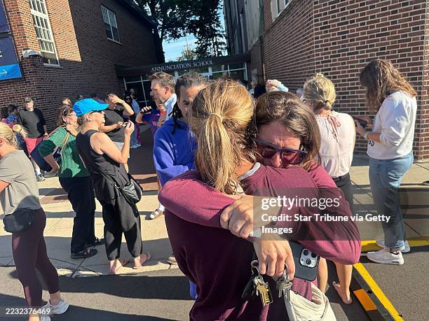 Parents await news of their children's status after shooting at Annunciation Church on Wednesday morning, Aug. 27, 2025 in Minneapolis.