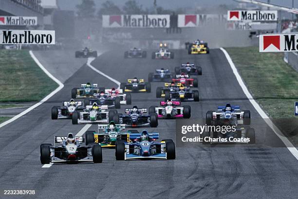Nick Heidfeld from Germany driving the West Competition Lola B99/50 Zytek V8 leads Gonzalo Rodríguez from Uruguay in the Team Astromega Lola B99/50...