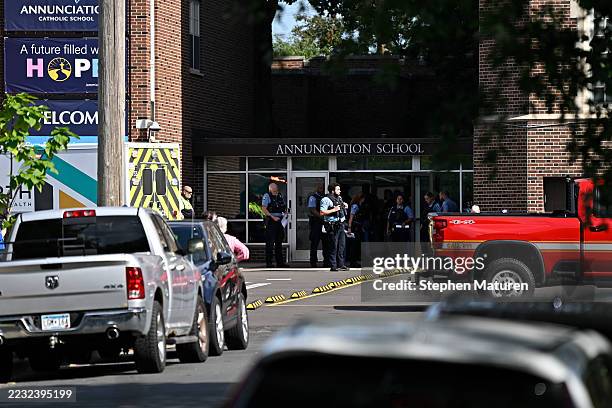 Police work the scene following a mass shooting at Annunciation Catholic School on August 27, 2025 in Minneapolis, Minnesota. According to...