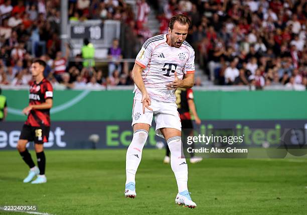 Harry Kane of Bayern Munich celebrates scoring his team's first goal from the penalty spot during the DFB Cup match between SV Wehen Wiesbaden and FC...