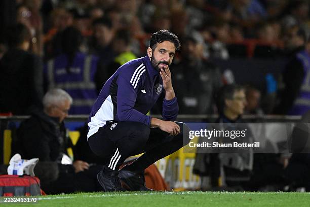 Ruben Amorim, Manager of Manchester United, looks dejected after his team concede during the Carabao Cup Second Round match between Grimsby Town and...