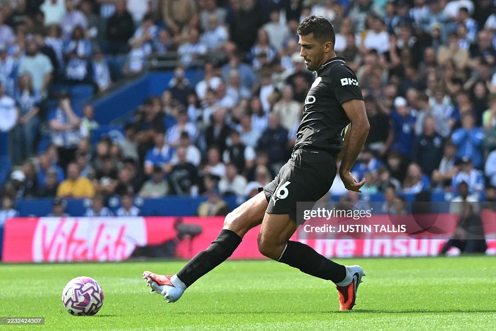 Rodiri Manchester City's Spanish midfielder Rodri passes the ball during the ...