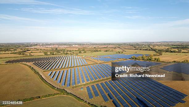 solar farm - abundance stock pictures, royalty-free photos & images