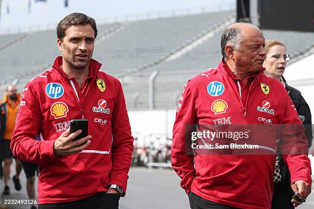 Jerome d'Ambrosio, Deputy Team Principal at Scuderia Ferrari and Frederic Vasseur, Team Principal of Scuderia Ferrari walk in the Paddock during...