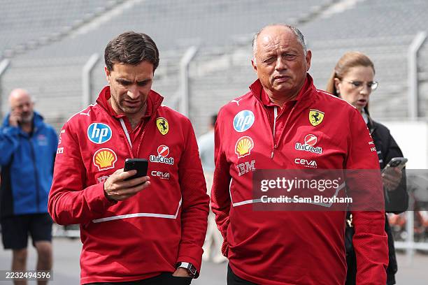 Jerome d'Ambrosio, Deputy Team Principal at Scuderia Ferrari and Frederic Vasseur, Team Principal of Scuderia Ferrari walk in the Paddock during...