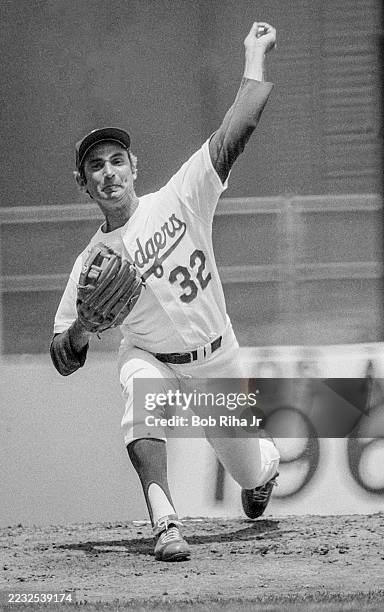 Los Angeles Dodgers legendary Pitcher Sandy Koufax pitches in an 'Old-timers Day' game at Dodgers Stadium, July 22, 1979 in Los Angeles, California.