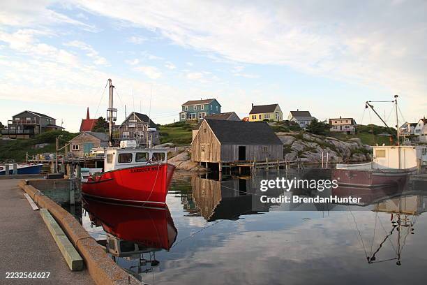 red and blue and rustic - peggys cove stock pictures, royalty-free photos & images