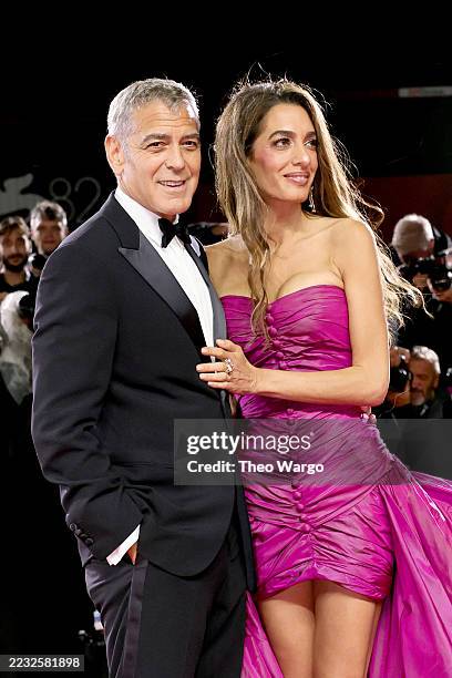 George Clooney and Amal Clooney attend the "Jay Kelly" red carpet during the 82nd Venice International Film Festival on August 28, 2025 in Venice,...