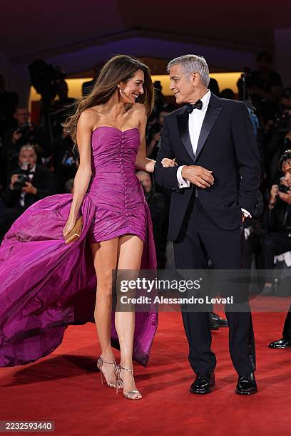 Amal Clooney and George Clooney attend the "Jay Kelly" red carpet during the 82nd Venice International Film Festival on August 28, 2025 in Venice,...