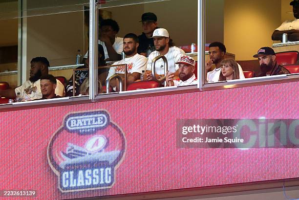 Patrick Mahomes , Travis Kelce of the Kansas City Chiefs, Taylor Swift and Jason Kelce watch during the first half of the game between the Cincinnati...