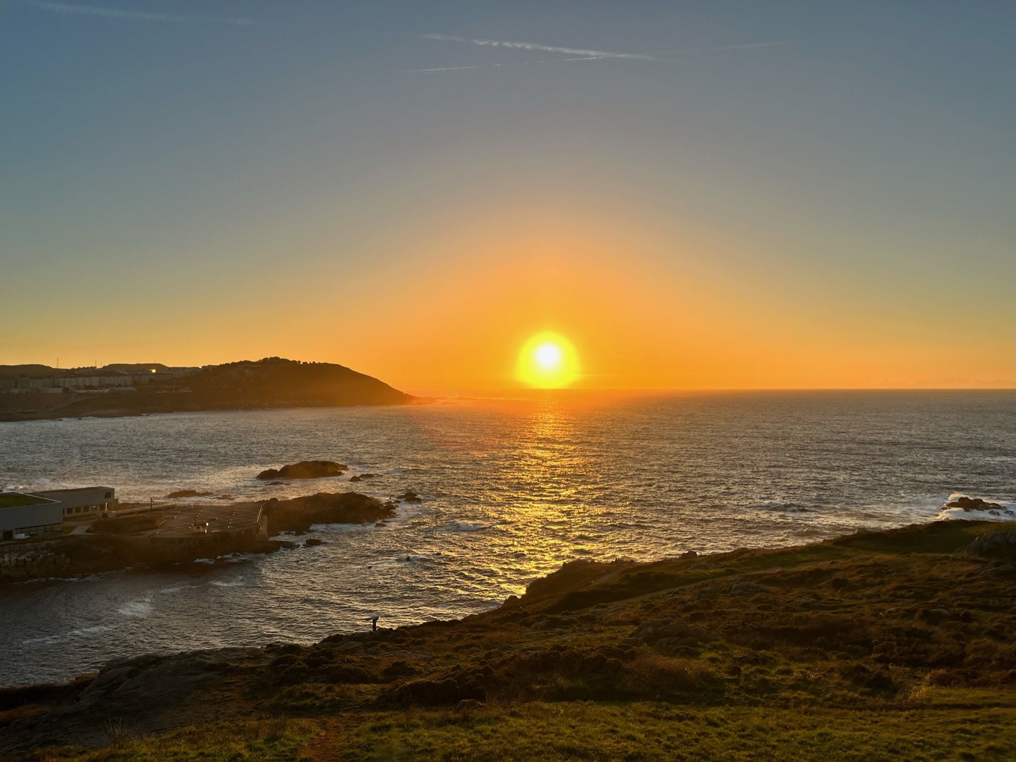 Golden Sunset Over Coastal Landscape Golden Sunset Over Coastal Landscape