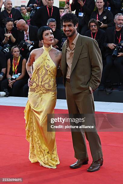 September 2025, Italy, Venedig: Singer Ashley Nicolette Frangipane and Avan Jogia arrive at the premiere of "The Smashing Machine" at the 82nd Venice...