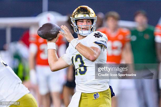 Notre Dame quarterback CJ Carr throws the ball during the college football game against the University of Miami Hurricanes on August 31, 2025 at the...