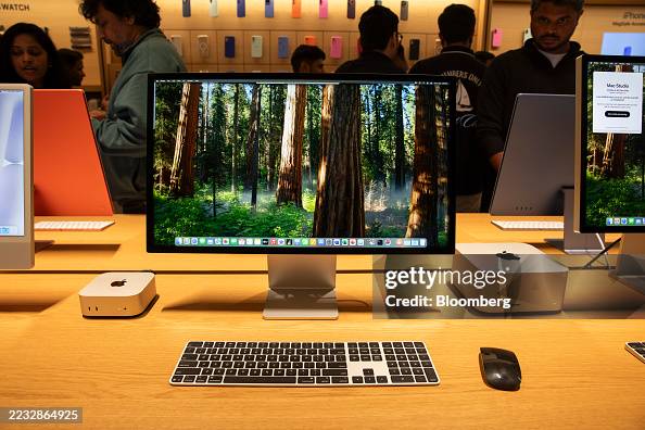 An Apple Inc. computer displayed at the company's new Hebbal store at ...