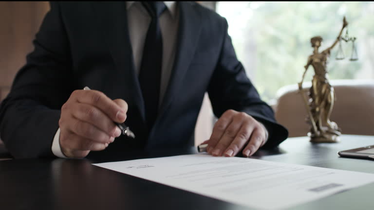https://media.gettyimages.com/id/2232873912/video/lawyer-signing-official-document.jpg?b=1&s=640x640&k=20&c=_U6ofDDbcoevp_BI0B_OV0KHlACsojvdDJouLZMX12M=