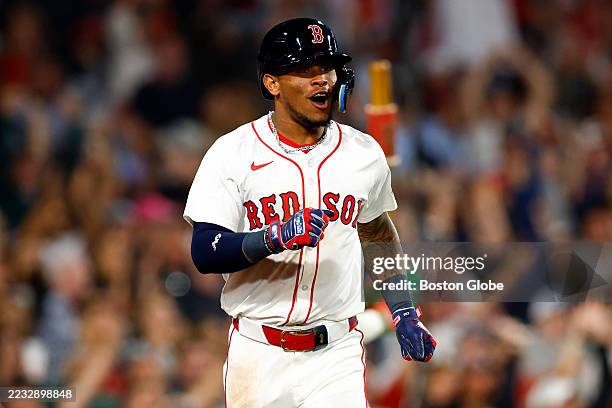 Boston, MA Boston Red Sox center fielder Ceddanne Rafaela reacts to teammate Alex Bregman getting on base after Rafaela scores in the eighth inning...