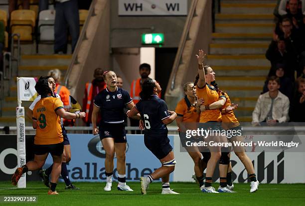 Caitlyn Halse of Australia celebrates with teammates after scoring her team's fourth try during the Women's Rugby World Cup 2025 Pool A match between...