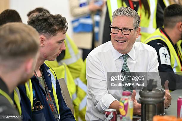 Britain's Prime Minister Keir Starmer speaks to ship builders during a visit to BAE Systems Scotstoun on September 4, 2025 in Glasgow, Scotland.