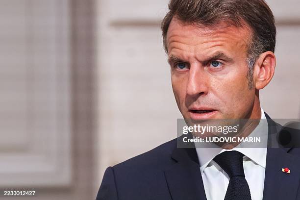 France's President Emmanuel Macron reacts as he speaks during a press conference following the Coalition of the Willing Summit, at the Elysee...
