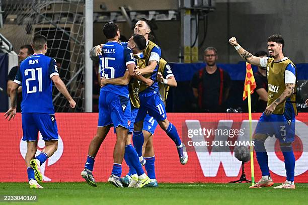 Slovakia's forward David Strelec celebrates with teammates scoring his team's second goal during the 2026 World Cup qualifiers Europe zone group A...