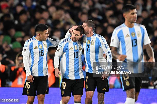 Argentina's forward Lionel Messi celebrates with teammates after scoring his team's first goal during the 2026 FIFA World Cup South American...