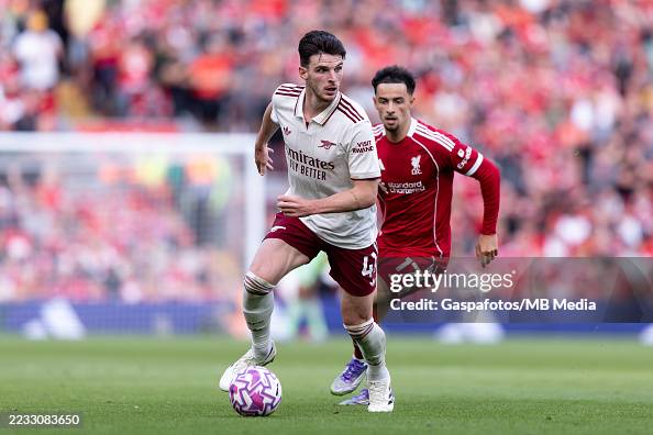 Cath Rice Liverpool Declan Rice of Arsenal is challenged by Curtis Jones of Liverpool ...