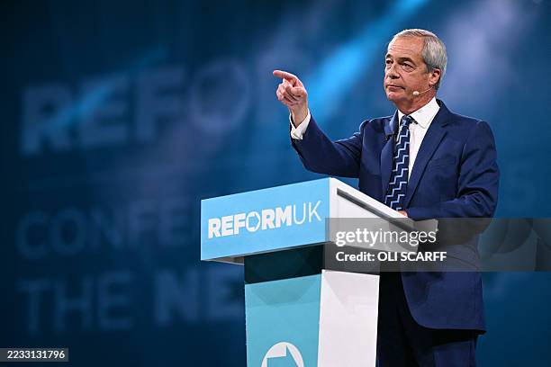 Reform UK Leader Nigel Farage delivers his speech on the first day of the Reform UK party conference at the NEC Birmingham, central England, on...