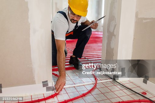 Construction engineer inspecting cheching work progress Construction engineer inspecting cheching work progress